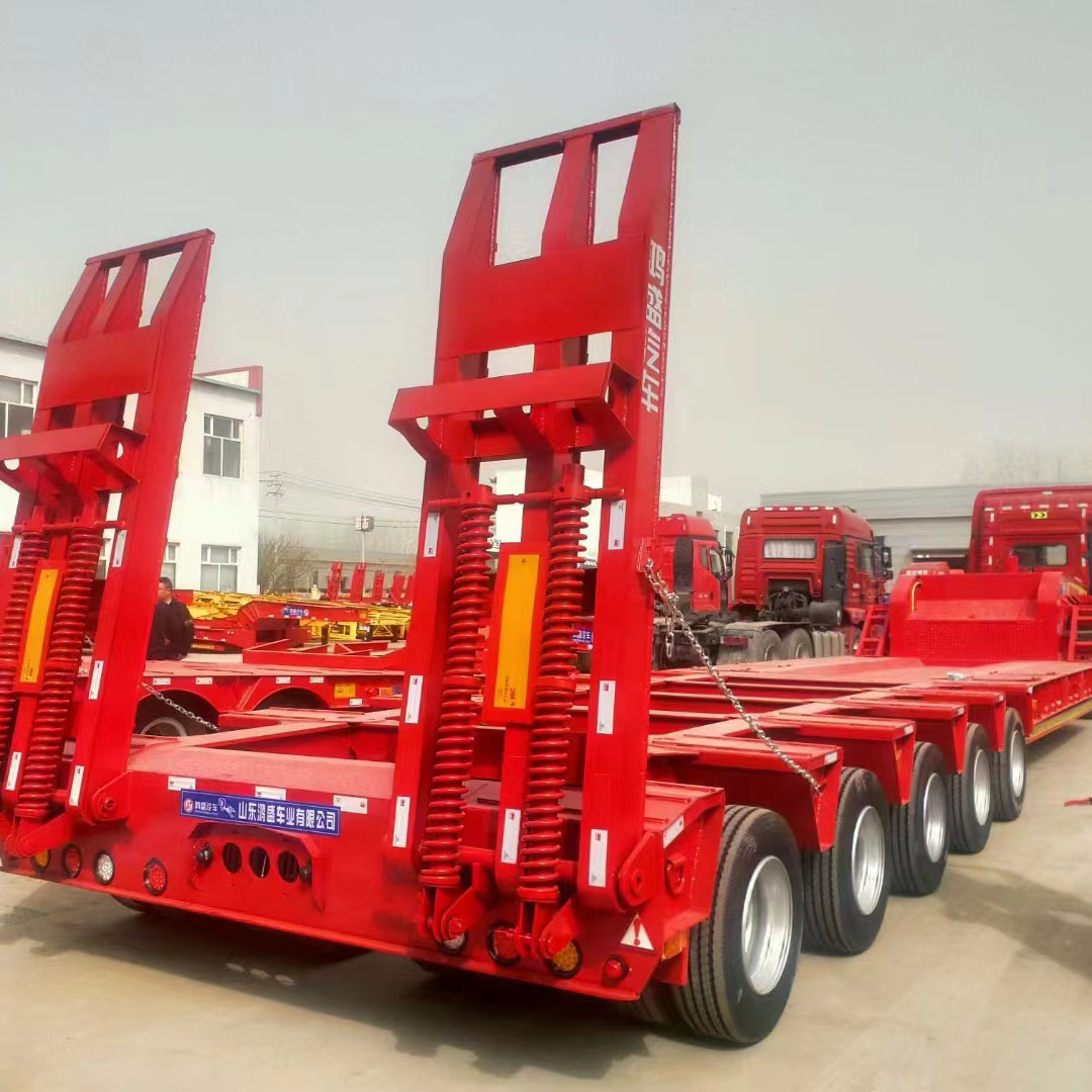 热销11米低平板半挂车 液压爬梯两桥三桥钩机板半挂车 全国上户