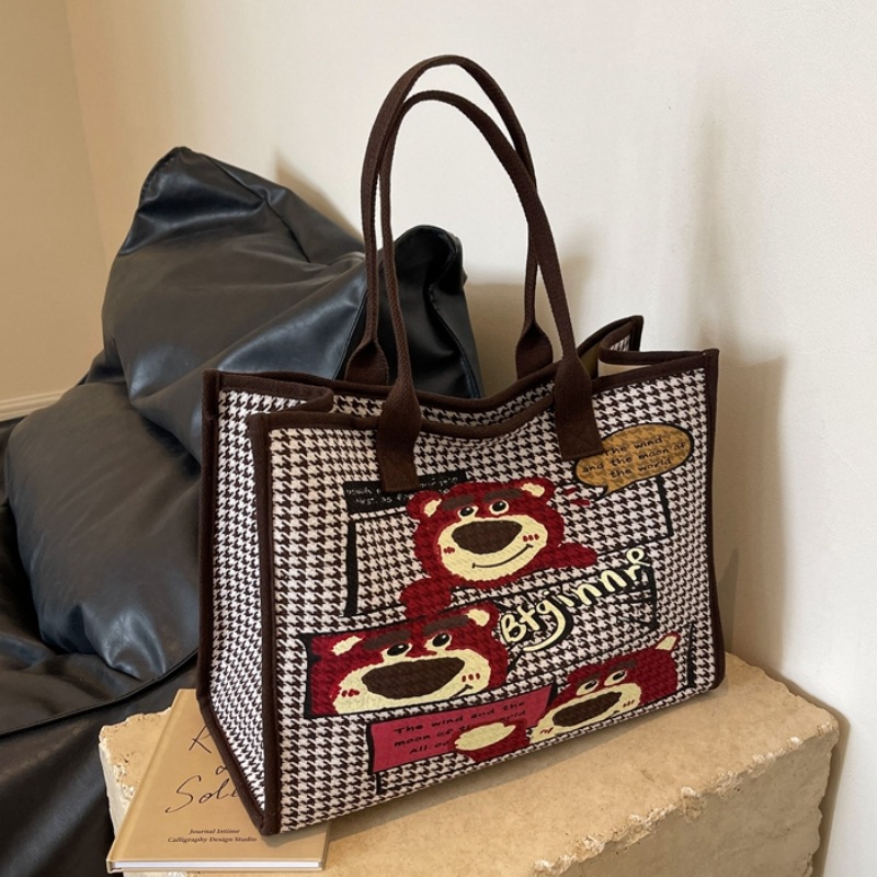 帆布包女大容量包包2024新款可爱草莓熊手提袋百搭通勤单肩托特包