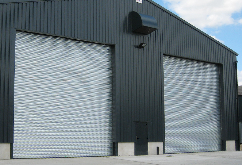 苏州电动遥控抗风卷帘门 金属硬质抗风卷闸门 工业厂房仓库卷帘门