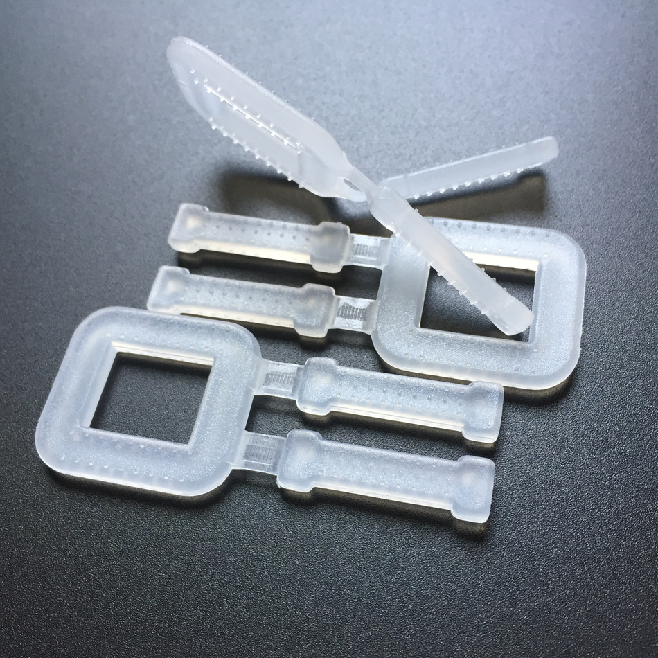 pp打包扣新料透明塑料扣乳白塑料拉扣人字扣纸箱打包 塑料打包扣