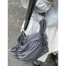 休闲帆布包包女式背包2024新款韩版字母托特包百搭大容量斜挎包