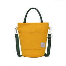 日韩单肩购物袋拉链 手提黄色帆布水桶包包 单肩斜跨旅游收纳包