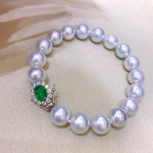 高品质淡水灰珠 正圆微瑕带点冷银皮光泽 很显白的颜色绿色点缀