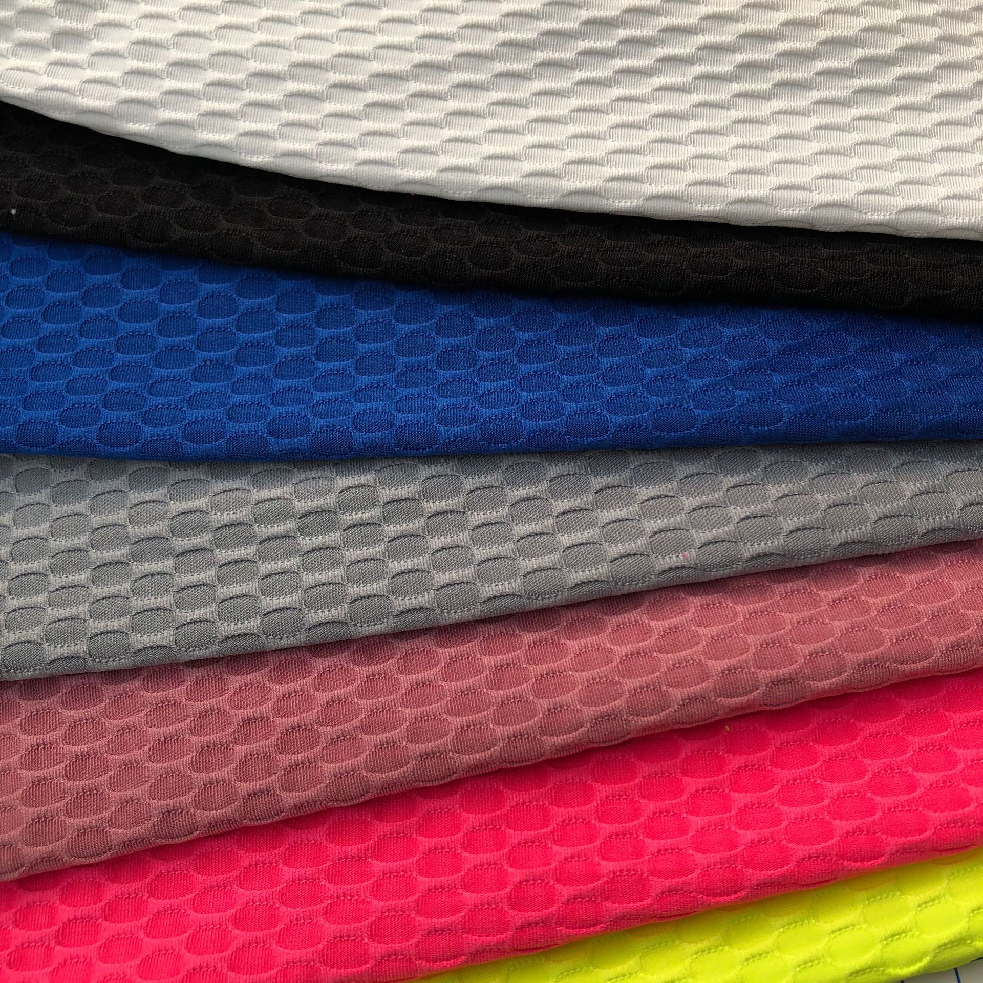 245g涤纶弹力提花针织面料 运动 泳装 瑜伽 电臀 服装等适用布料