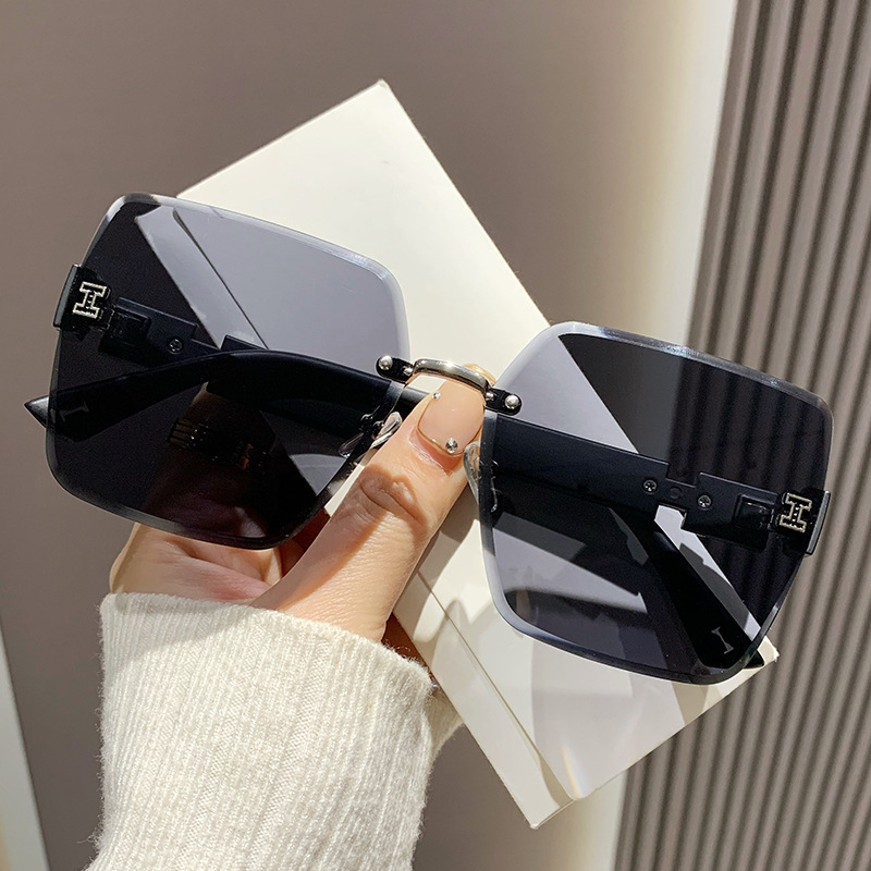 2023 New Frameless Two-Color Gradient High Sense Women's Fashion Driving Sunglasses Fashion Sunglasses Wholesale Factory