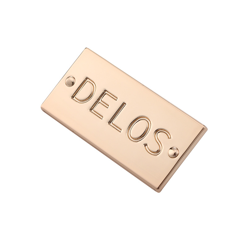 Hot Selling Zinc Alloy Clothing Logo Metal Plate Customized Die-Casting Rectangular Concave-Convex Letter Perforated Metal Tag