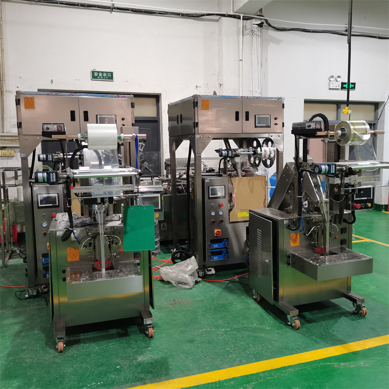 三角包组合功效茶饮品包装机 四头秤金银花配方药茶定量分装机械