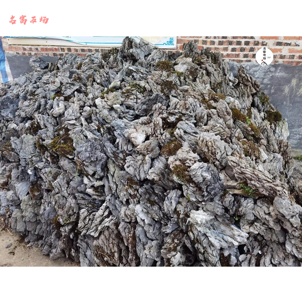 一吨青龙石价格 打造鱼缸盆景装饰石头 假山流水喷布石头
