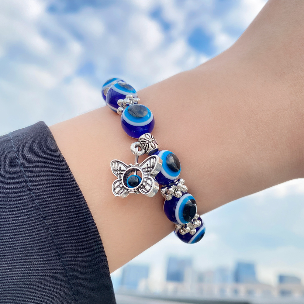 Amazon Hot Devil Eye Bracelet Butterfly Elephant Fatima Hand Pendant Resin round Beads Blue Eyes Bracelet