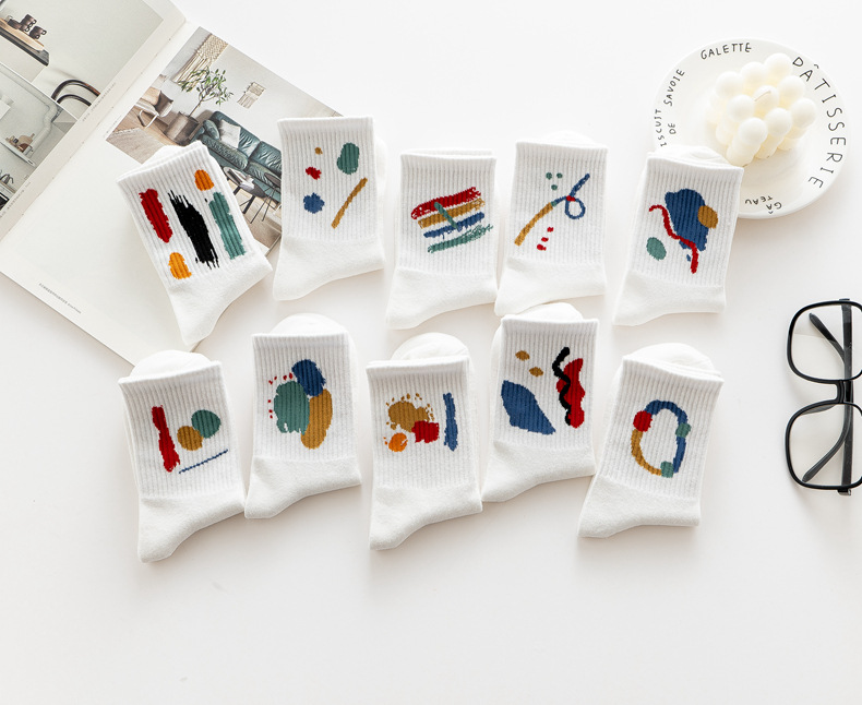白色涂鸦女袜子女中筒ins潮流简约秋冬款韩版学院风运动长筒棉袜