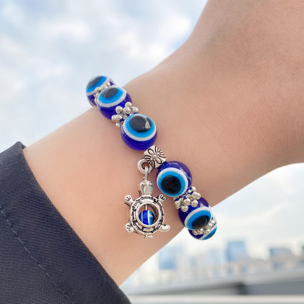 Amazon Hot Devil Eye Bracelet Butterfly Elephant Fatima Hand Pendant Resin round Beads Blue Eyes Bracelet