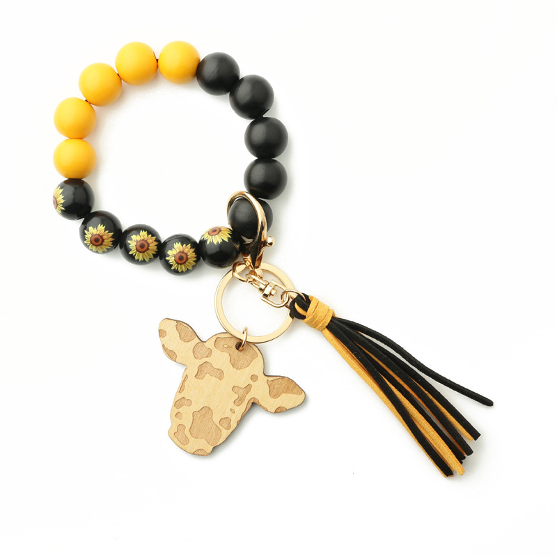 New Products in Stock European and American Ornament Tassel Pendant Western Cowboy Bracelet Cow Wooden Beads Bracelet Cow Head Keychain