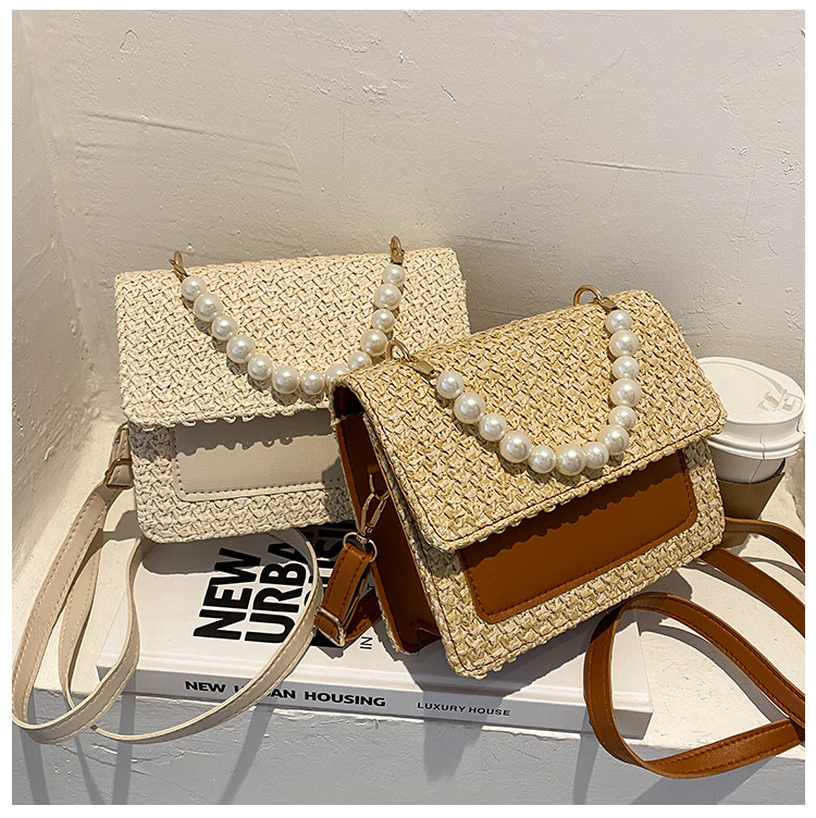 Women's Bag 2021 New Simple Woven Straw Fashion Portable and Fashion Pearl Shoulder Popular Messenger Bag Wholesale