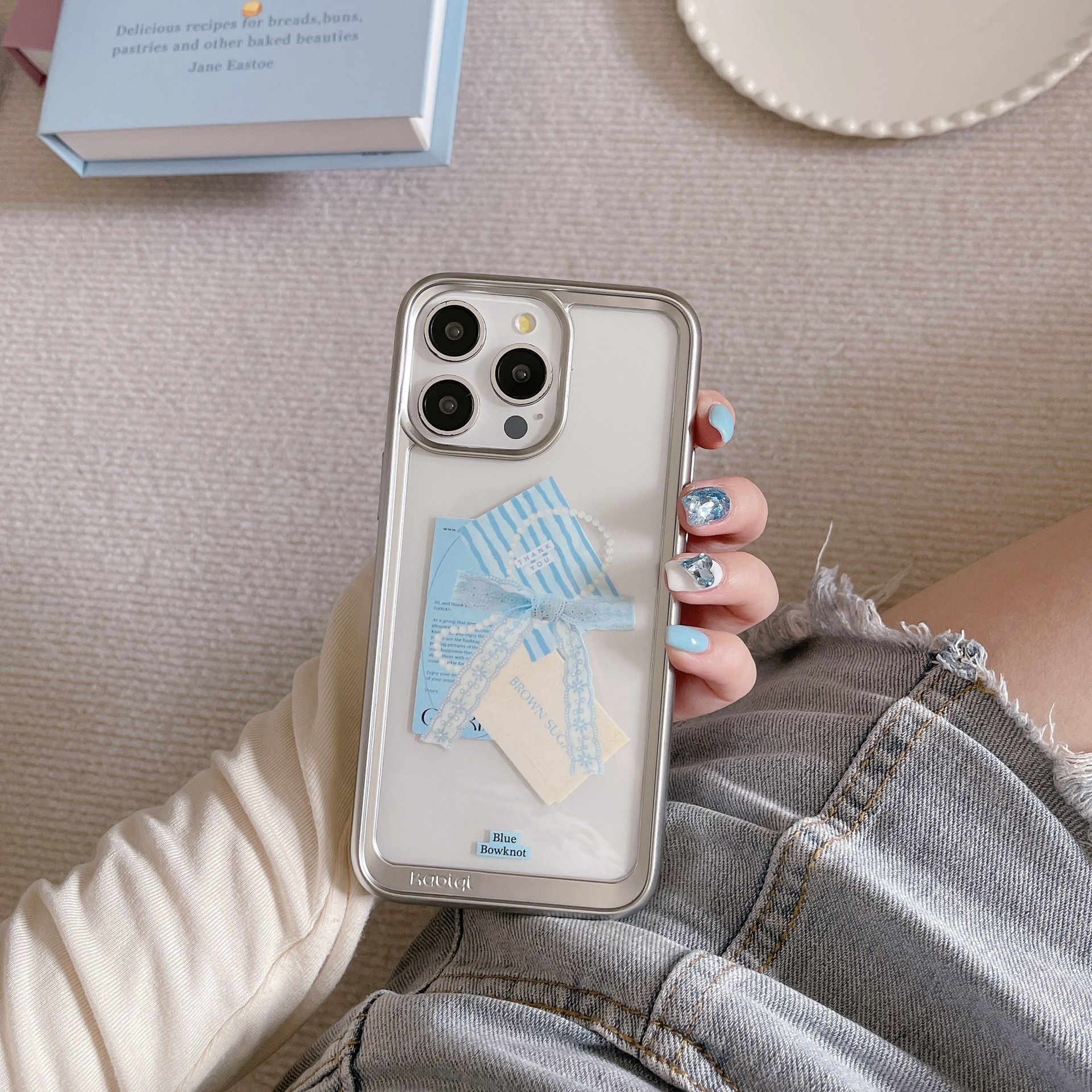 小众蓝色蝴蝶结适用iphone14pro max苹果15手机壳13/12透明电镀壳