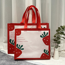 新年红色草莓手提袋子童装不织布布袋服装店可爱包装袋水果礼物袋