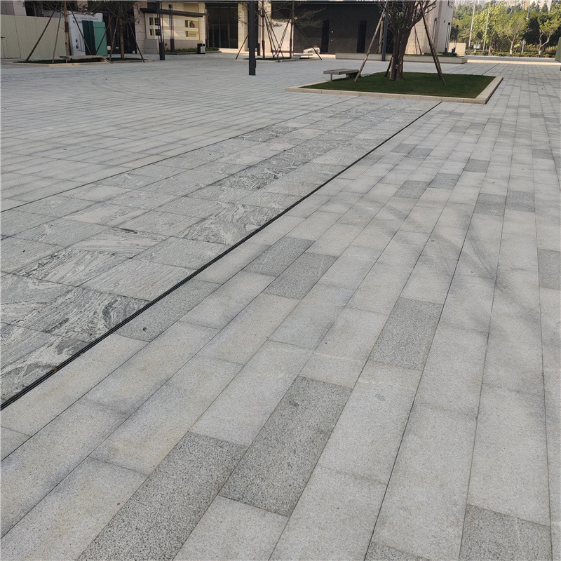 黄锈石花岗岩车库入口墙面铺装地面荔枝面花岗岩行车石材厚度地砖