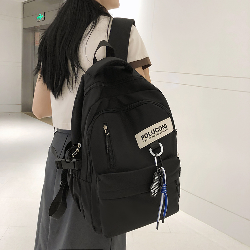 外贸书包大学生高中生大容量学院风双肩包简约休闲运动韩版情侣背