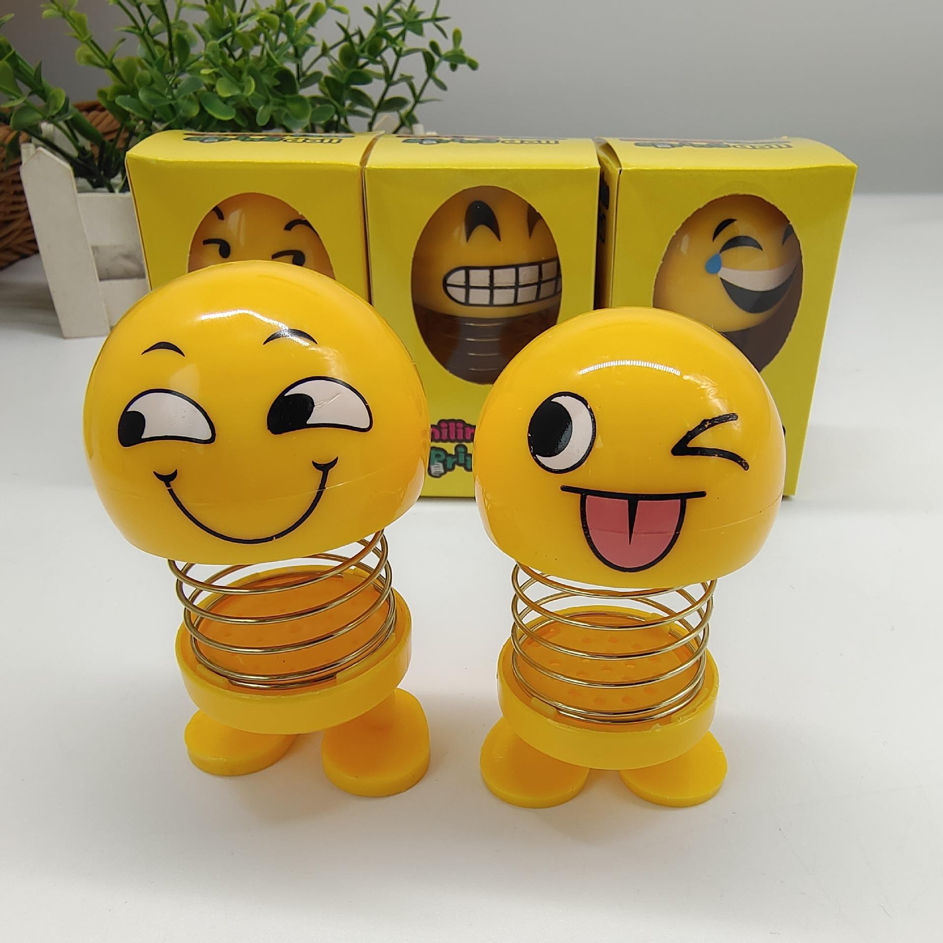 笑脸弹簧公仔小黄表情包抖音摇头公仔新奇特汽车车载摆件娃娃玩具