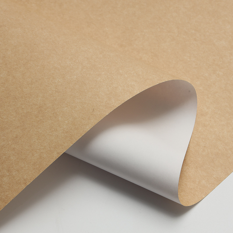 包装用纸挂面牛卡纸鲜花礼品牛皮外包装纸白面黄底牛卡纸可定制