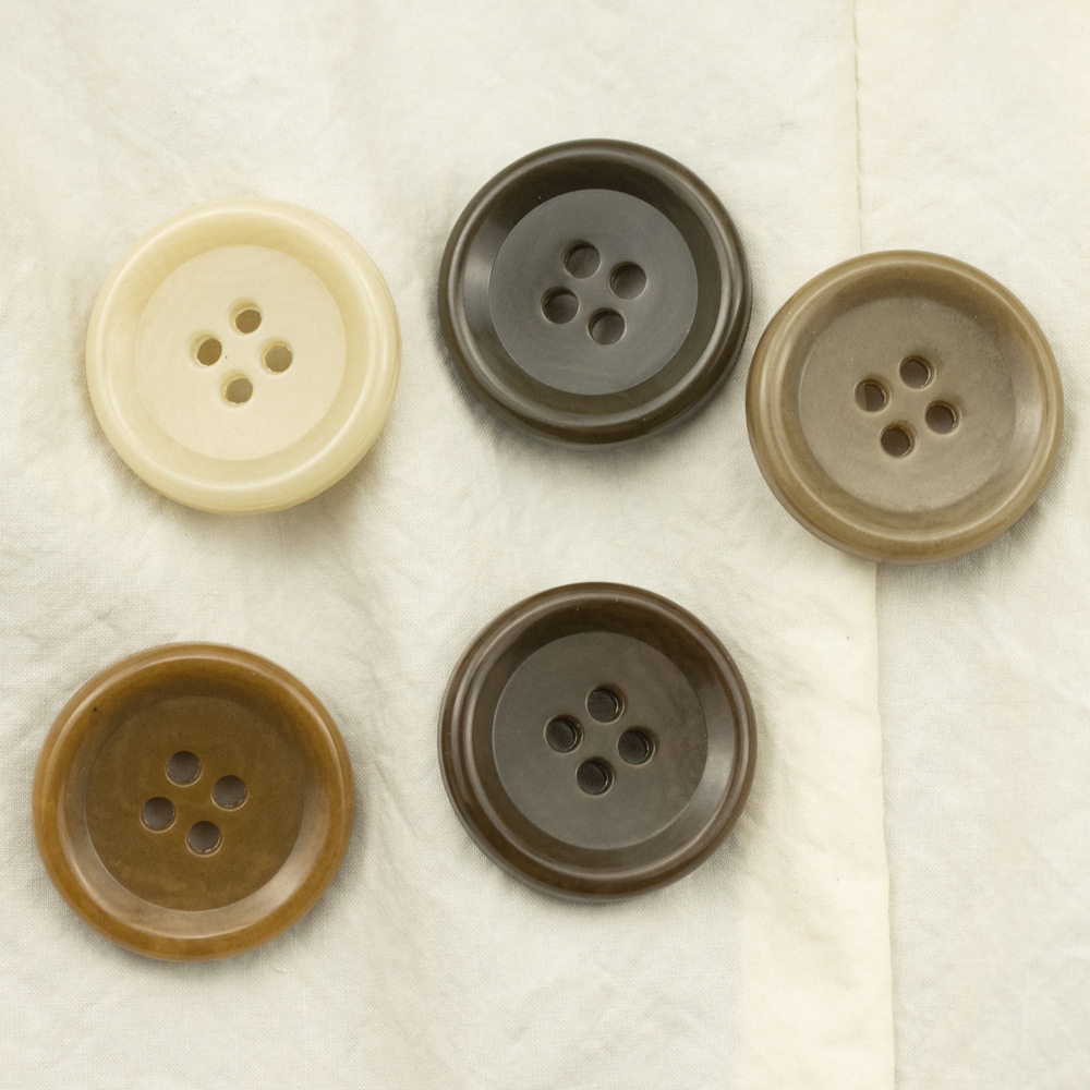 圆形纽扣黑墨绿米白色羊毛呢尿素扣子连衣裙开衫毛衣扣子