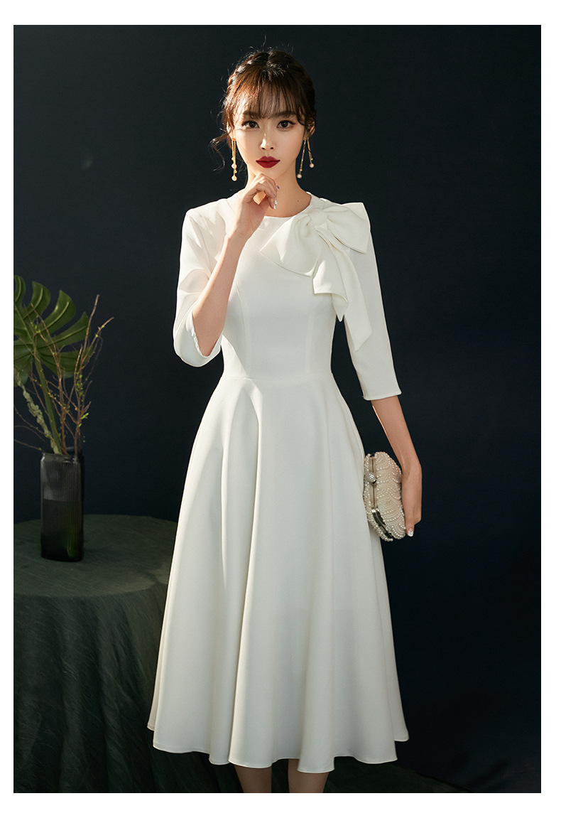 白色缎面晚礼服2022新款气质宴会轻奢小众高端名媛白色中长连衣裙