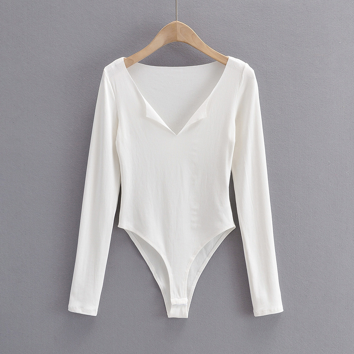 春季新款欧美女装时尚纯色毛边v领长袖修身连体衣l1762