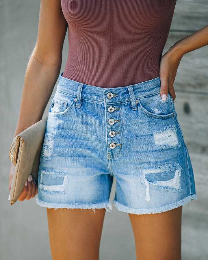 厂家直销欧美女装亚马逊新款破洞贴布流苏个性一排扣牛仔短裤热裤