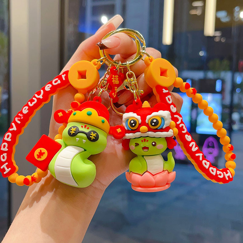 cartoon snake year keychain lion god of wealth pendant national fashion gift couple bags ornaments baby catching machine gift wholesale