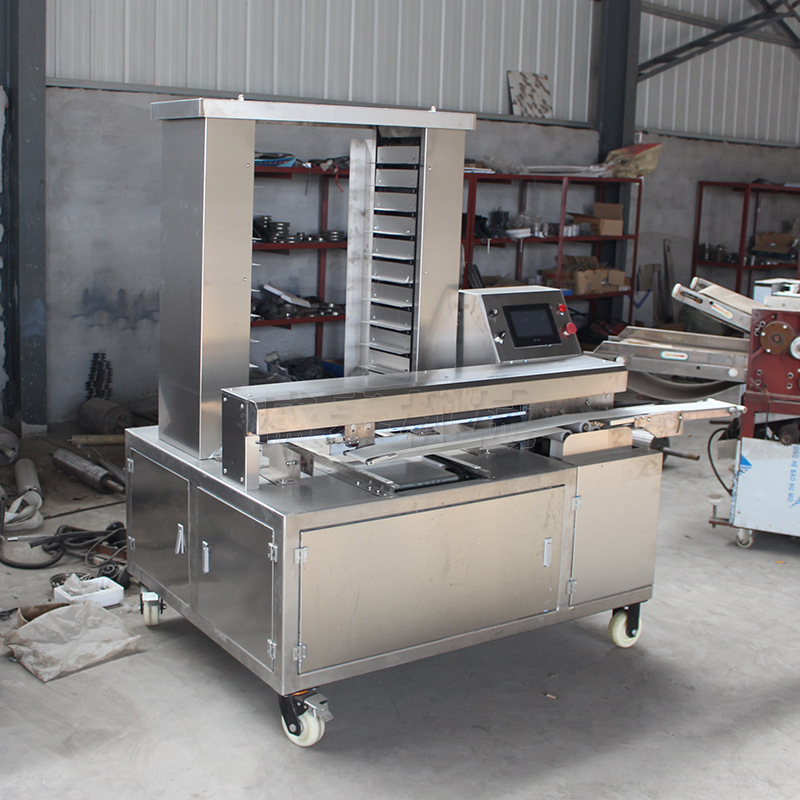 全自动排盘机 饼干糕点高速摆盘机 凤梨酥自动摆盘设备一次性装盘