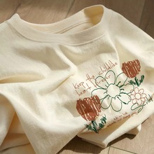 韩版宽松纯棉t恤女短袖设计感小众卡通印花百搭圆领米黄色上衣夏