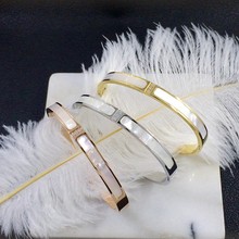 韩版白贝母贝壳镶嵌三个钻镶钻气质简约18K金色手镯潮钛钢手环女
