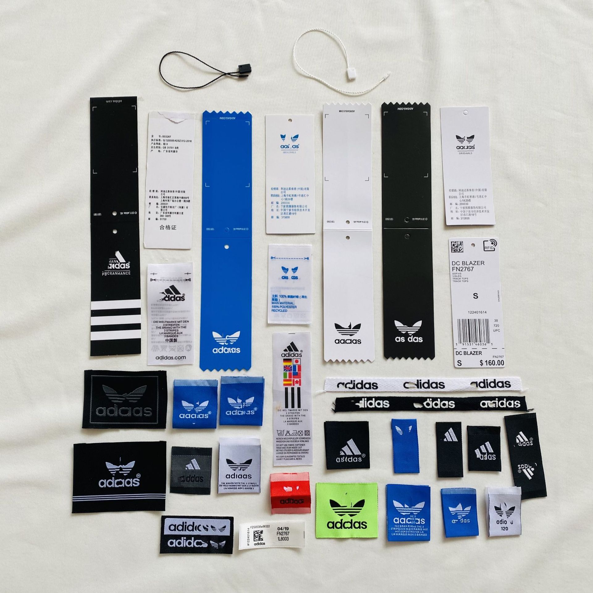 adidas三叶草adi吊牌领标水洗织唛包装袋品牌现货辅料防伪扣