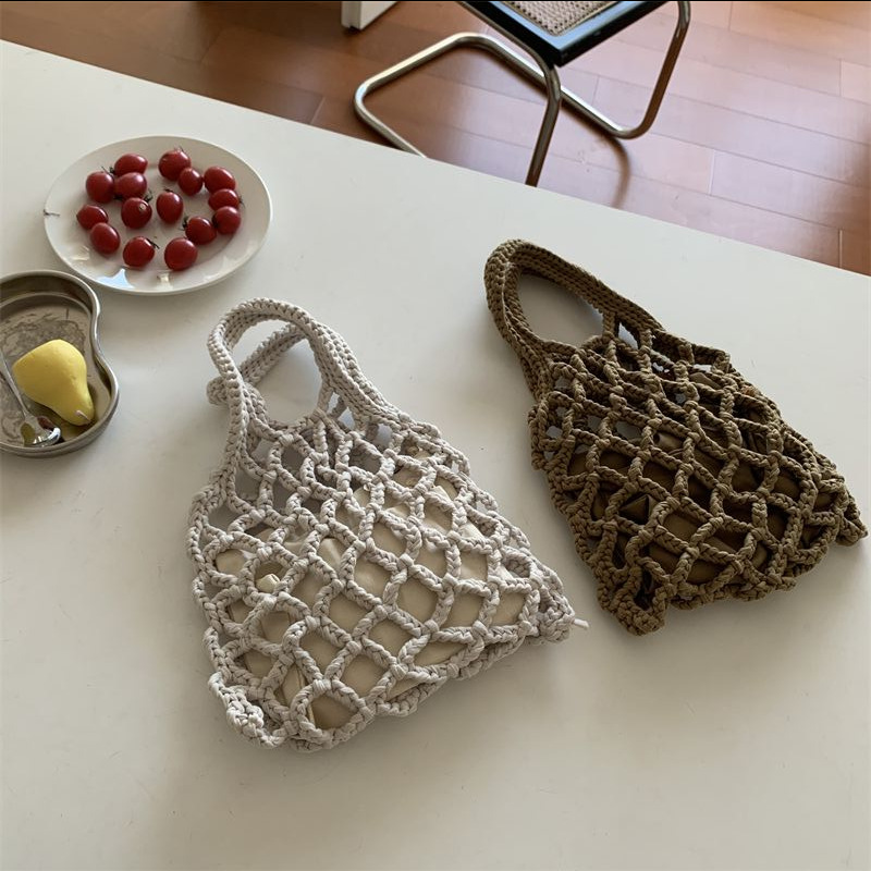 编织包女休闲手提水桶小包包镂空手工编织袋手拎小包包日常百搭潮