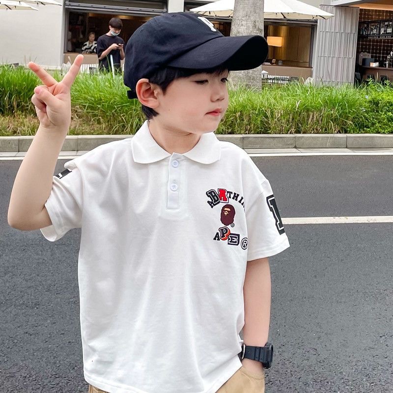 2023 Summer New Boys' Trendy Brand Letter Polo Shirt Small and Medium-sized Children's Black and White Short-sleeved T-shirt Lapel Top Trendy image