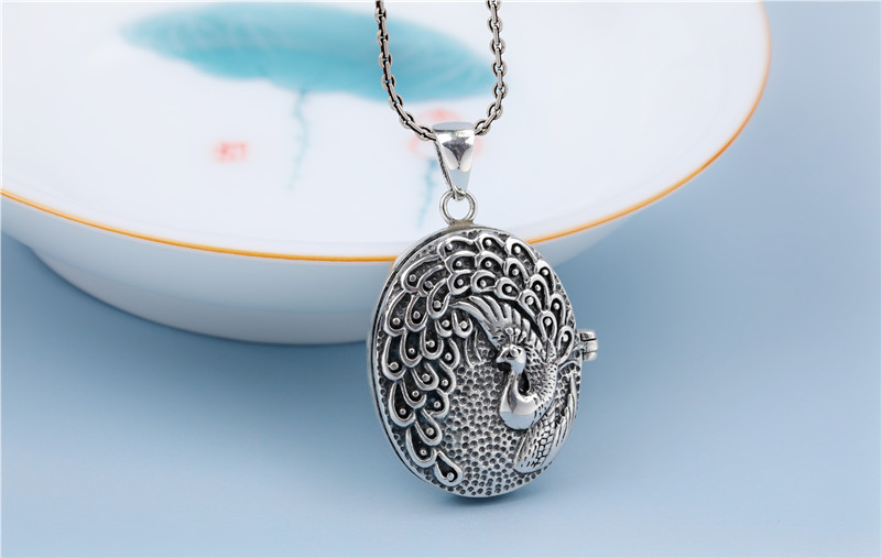 s925银大气孔雀吊坠复古银饰女士镂空凤凰噶乌盒长款民族风毛衣坠