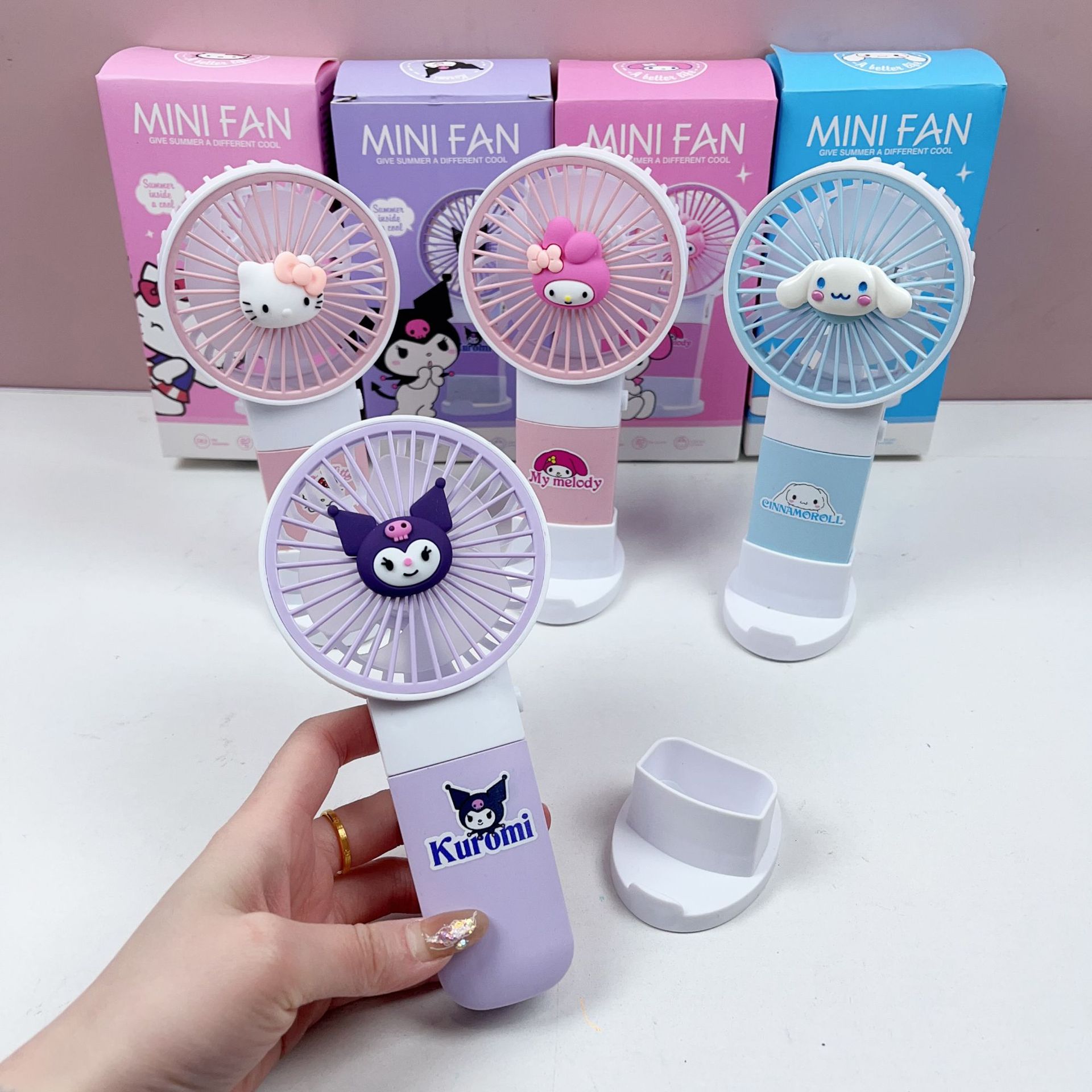 外贸三丽鸥便携手持小风扇库洛米学生创意手机支架桌面电池小风扇