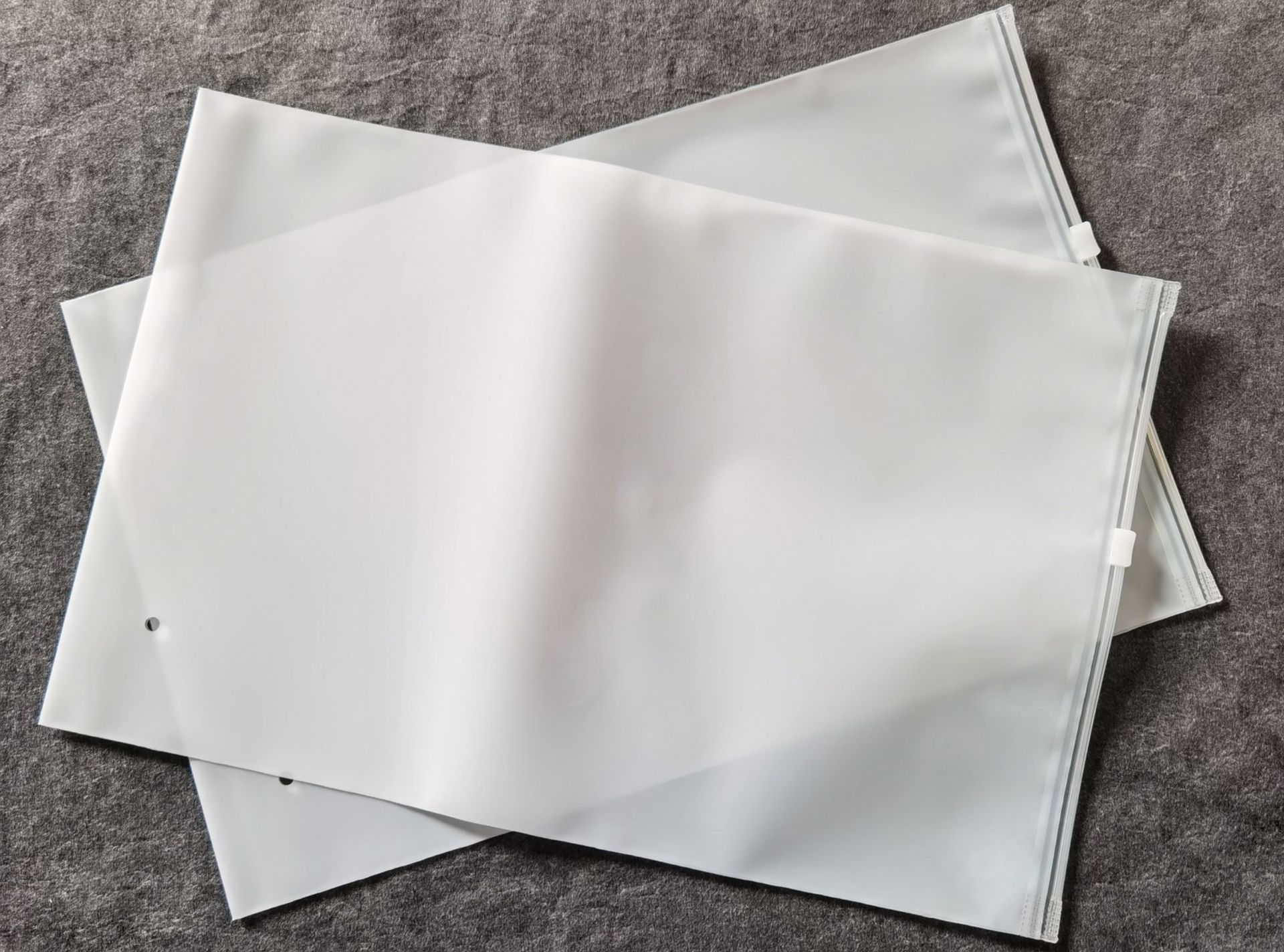 全新材质服装磨砂半透明包装袋塑料自封胶袋内衣拉链袋曼联包装袋