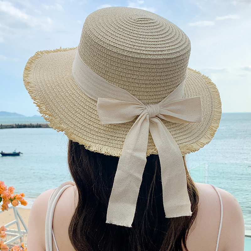 帽子春夏款女时尚草帽 海边度假沙滩帽平顶飘带太阳帽一件代发