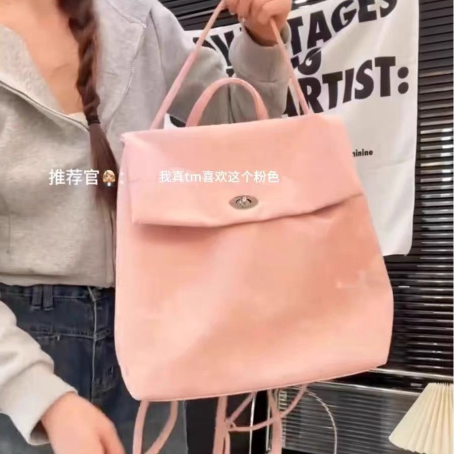 韩国粉色双肩包包女2024新款手提学生通勤书包百搭大容量旅游背包