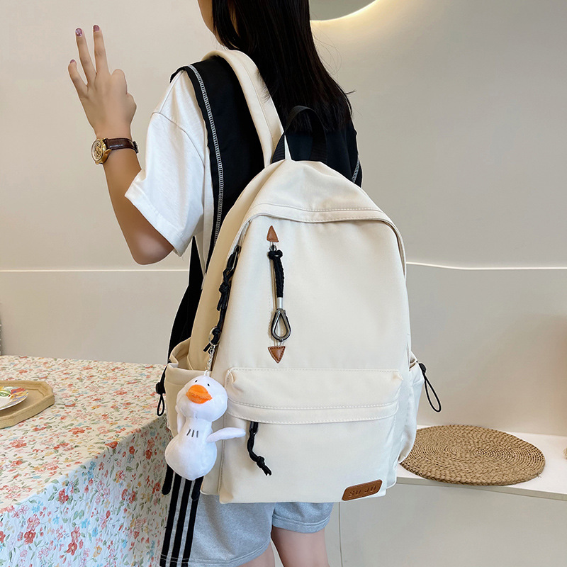 2022 New Korean Style Simple Junior High School Male and Female Students Large Capacity Solid Color Leisure Schoolbag Outdoor Backpack
