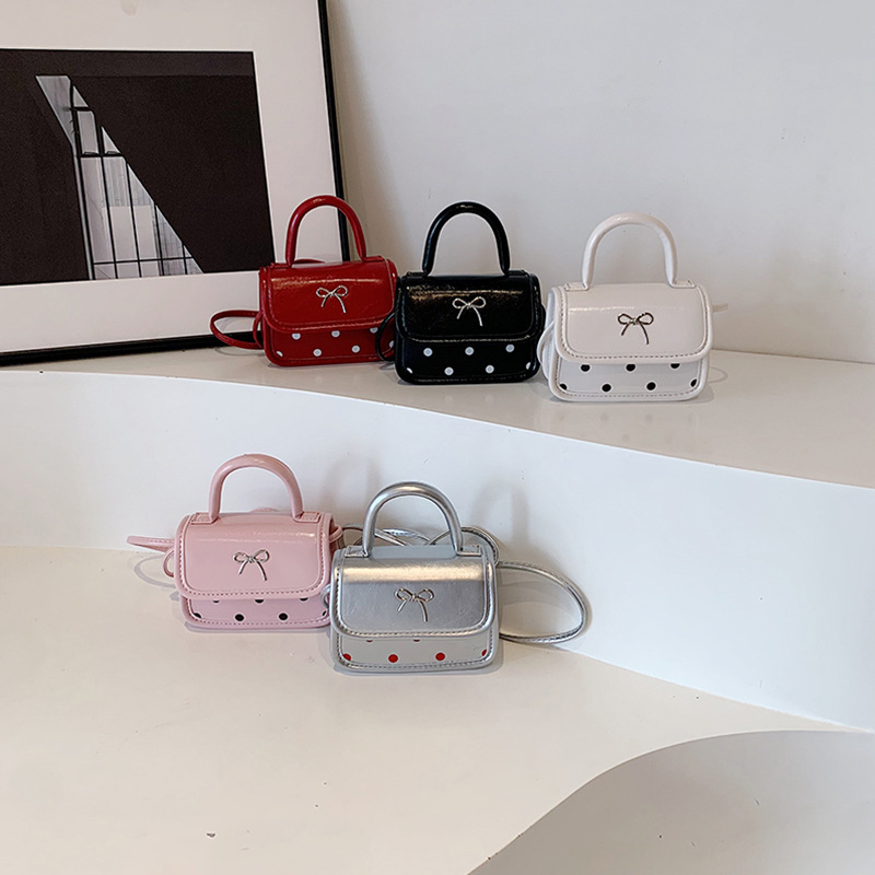 儿童包秋冬新款小红书同款波点手提包蝴蝶结迷你亲子斜挎包口红包