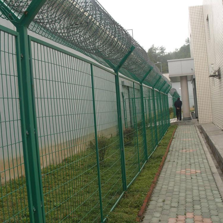 防盗刺滚笼监狱围墙防盗网刀片刺网防爬刺网刺绳铁蒺藜带刺铁丝网