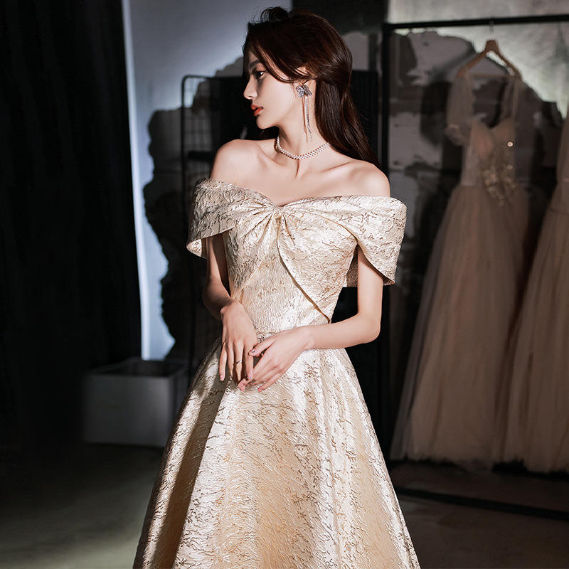 一字肩金色晚礼服2022新款夏季法式生日宴会气质连衣裙宴会晚礼服