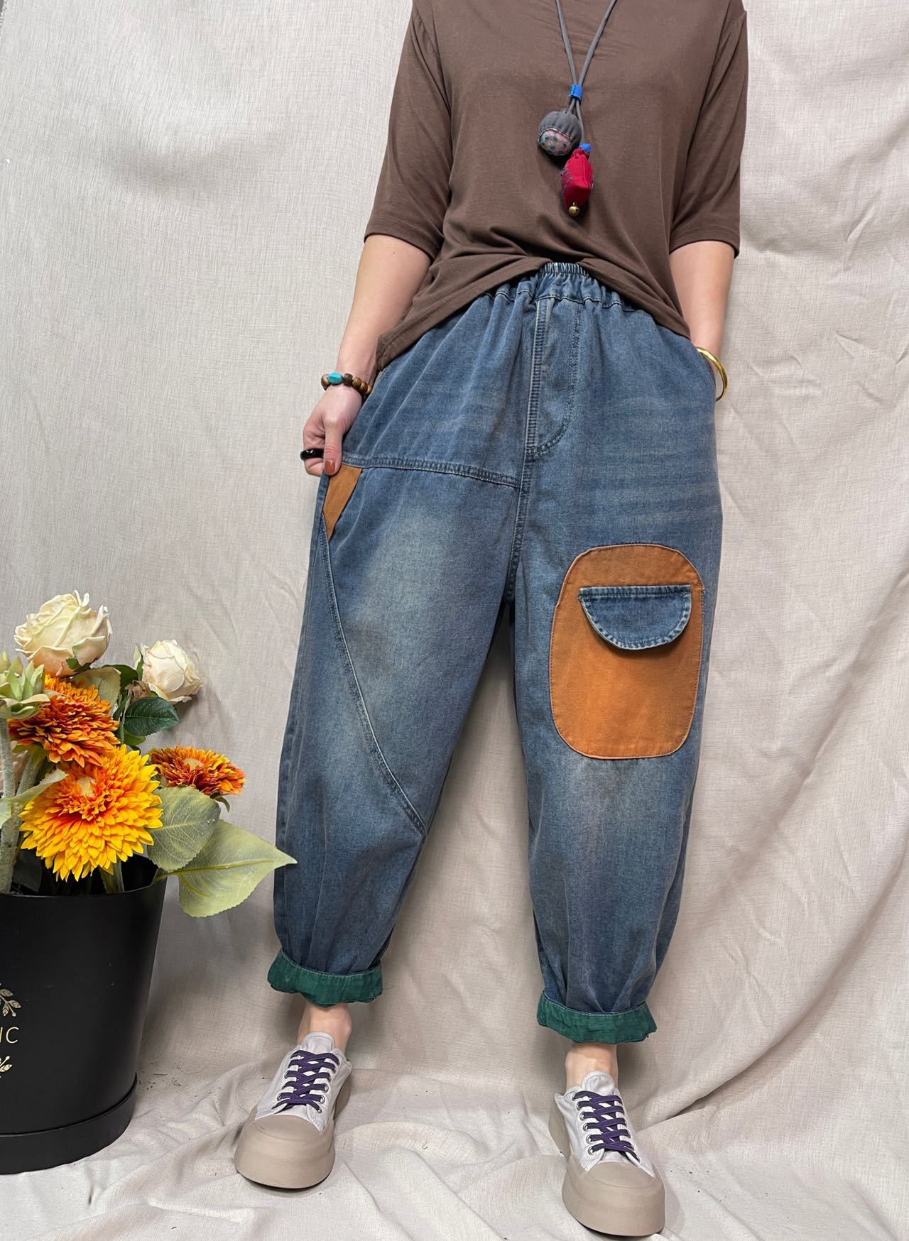 新款宽松个性拼接牛仔垮裤女撞色卷裤脚做旧老爹哈伦裤-阿里巴巴