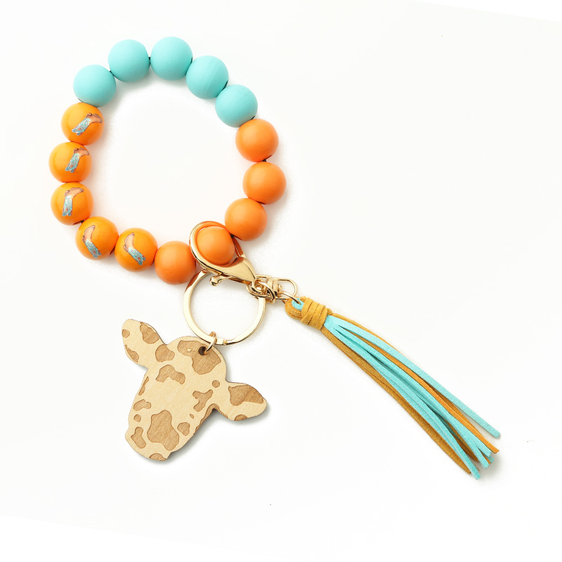 New Products in Stock European and American Ornament Tassel Pendant Western Cowboy Bracelet Cow Wooden Beads Bracelet Cow Head Keychain