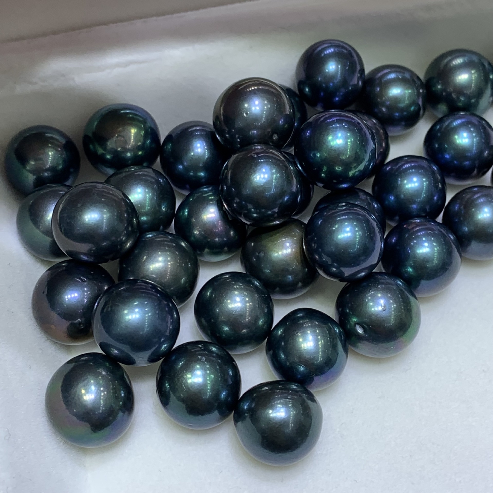 淡水大溪地黑珍珠孔雀绿大颗粒圆珠近圆有瑕疵12-13厂家批发源头