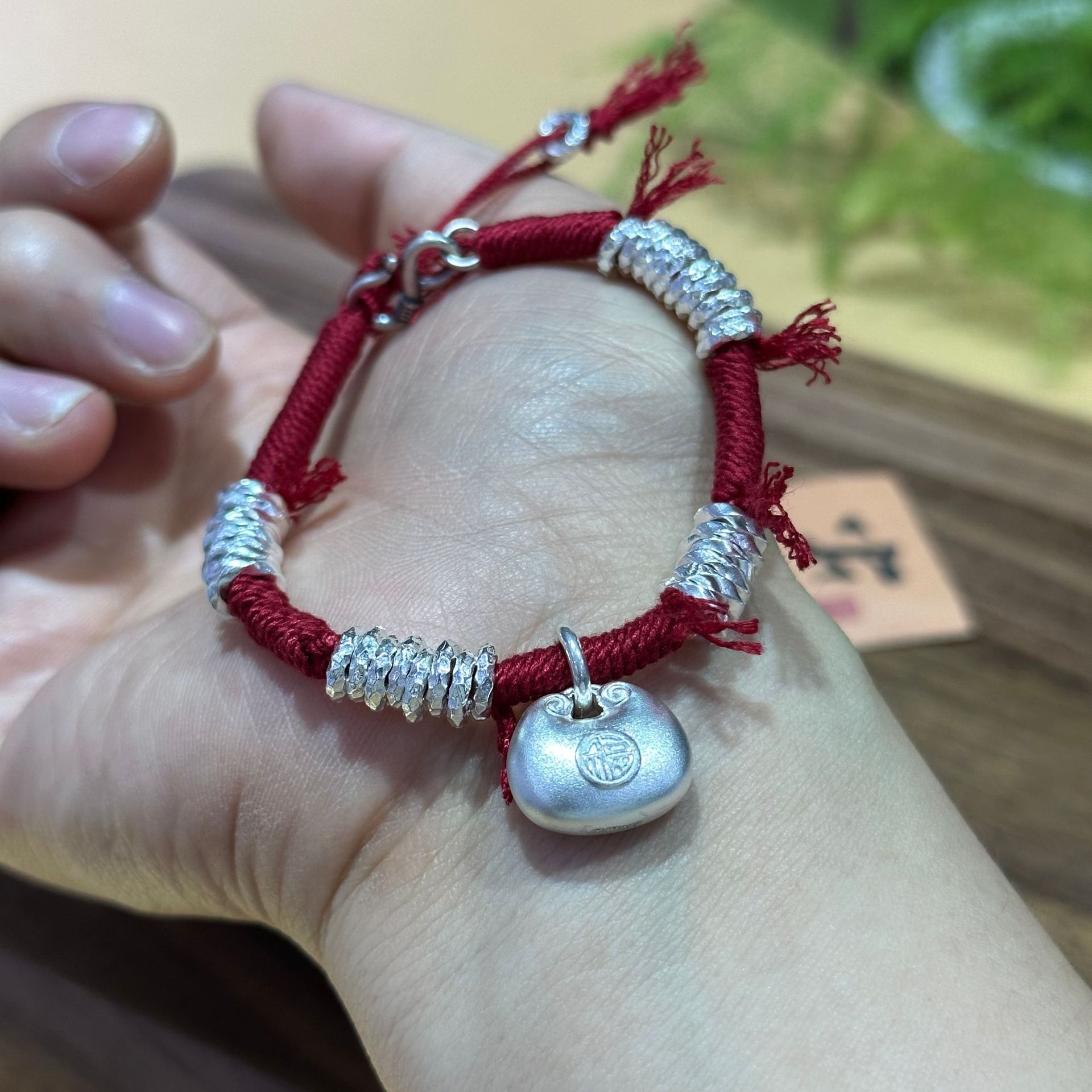 乾龙s999银手工编织藏风银盘缠手串双面胖福缠手链高级圆牌手链