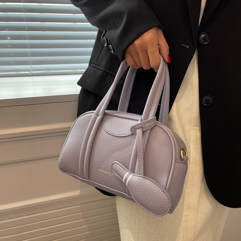2022 New Niche Designer Songmont Bowling Bag Boston round Bag Women's Bag Hand Holding Pillow Bag