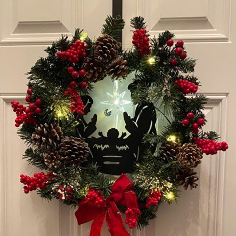 圣诞节花环耶稣生了松树枝红色浆果松果红色蝴蝶结基督教耶稣花圈