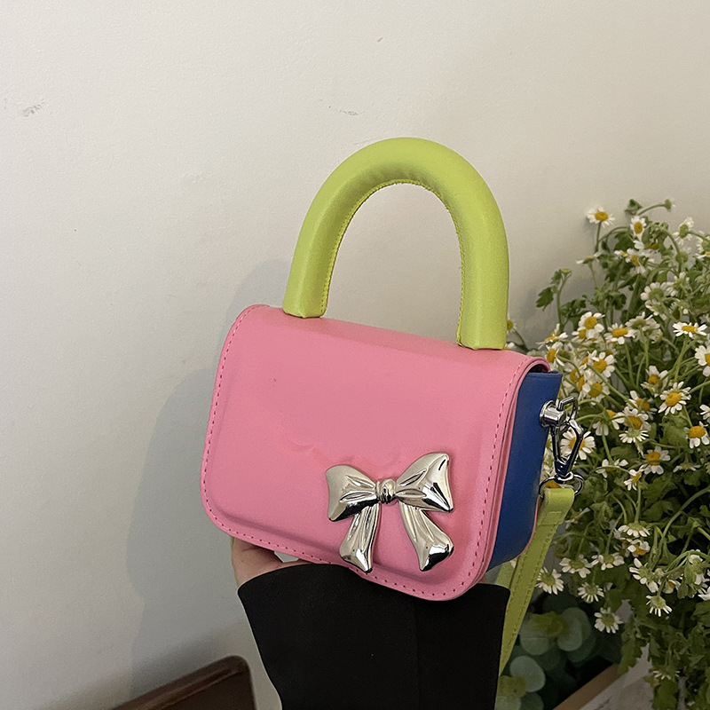 精致时尚手提包包女2024新款洋气蝴蝶结单肩包糖果色可爱迷你女包